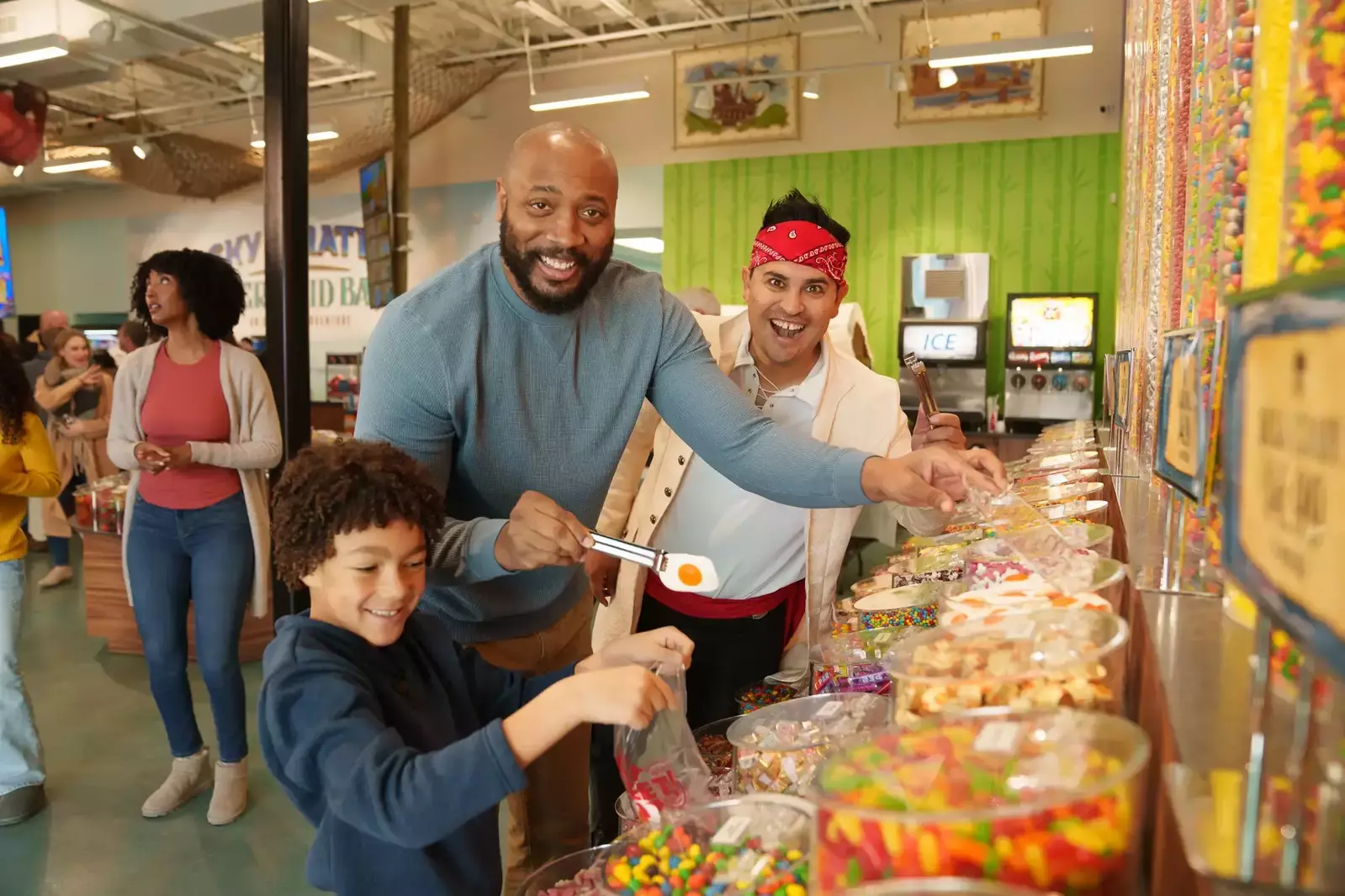 family getting candy at Sky Pirates