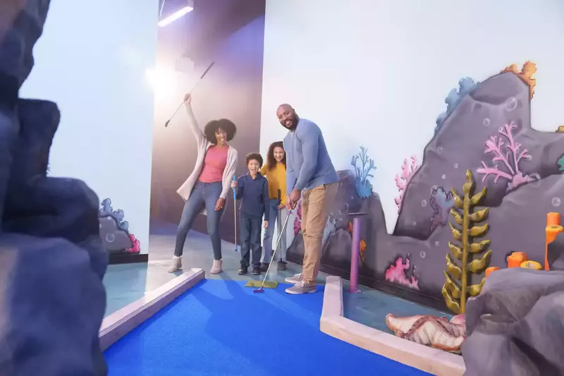 family on the mermaid course indoors