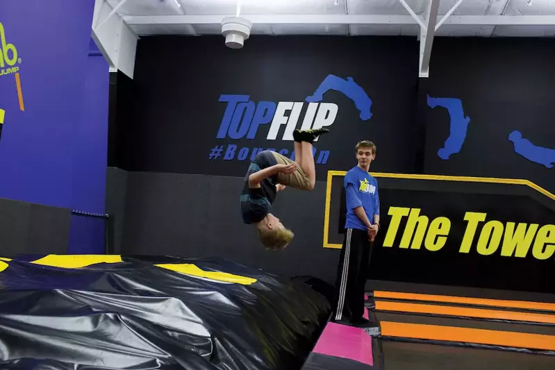 kid flipping at TopJump
