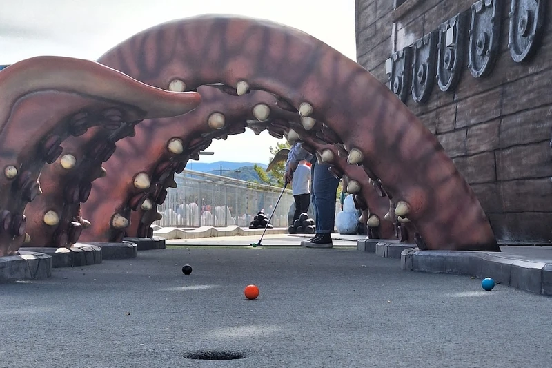 players playing on Pigeon Forge mini golf course